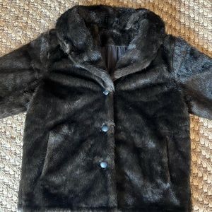 Faux fur coat, unsure of brand because there’s no label.